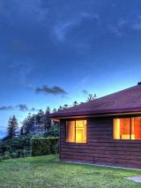 Norfolk Island – Whispering Pines Cottages with return flights